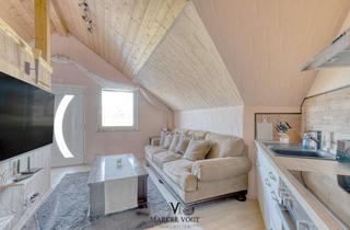 Wohnung kaufen in 72584 Hülben, 2-Zimmer-Obergeschosswohnung mit Infrarotkabine und Blick ins Grüne