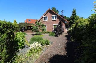 Einfamilienhaus kaufen in 21762 Otterndorf, Exquisites Einfamilienhaus mit idyllischer Gartenanlage + Teich, Saunahaus, Carport & neue Heizung