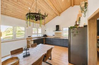 Haus kaufen in 36251 Ludwigsau, Einziehen und wohlfühlen: Moderner Bungalow mit Terasse und großem Grundstück