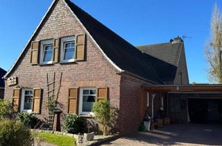 Einfamilienhaus kaufen in 26624 Südbrookmerland, Großzügiges Einfamilienhaus mit Wintergarten, schönem Garten und Garage in Sackgassenlage