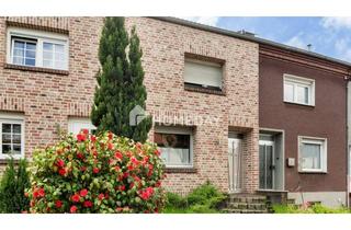 Reihenhaus kaufen in 59229 Ahlen, Wohnen mit Herz: Reihenhaus mit Kamin & sonniger Terrasse