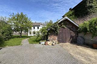 Einfamilienhaus kaufen in 41836 Hückelhoven, Freistehendes Einfamilienhaus mit Garten und großer Garage in Hückelhoven-Baal
