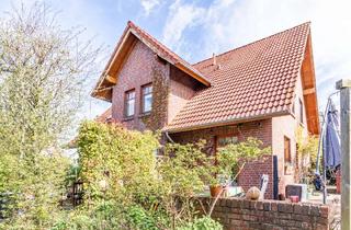 Einfamilienhaus kaufen in 26723 Larrelt, Solides Einfamilienhaus mit sonnigem Garten in familienfreundlicher Lage