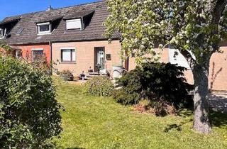 Haus kaufen in 24214 Tüttendorf, Vermietetes DHH mit großem Garten