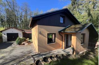 Haus kaufen in 04827 Machern, Natur Pur – Erholungsgrundstück mit Waldhaus, Garage und Atelier