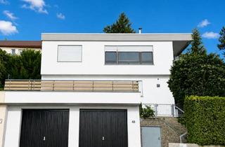 Haus mieten in Talstraße 48, 71272 Renningen, Großzügiger Flachdach-Bungalow mit Doppelgarage in ruhiger Lage