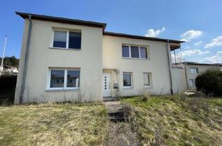 Haus kaufen in 34466 Wolfhagen, Geräumiges Zweifamilienhaus mit zwei Wohneinheiten in Wolfhagen!
