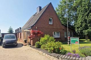 Haus kaufen in 25792 Neuenkirchen, Wohnhaus mit Einliegerwohnung und Weideblick
