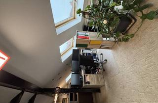 Wohnung kaufen in 61184 Karben, Gemütliche Dachgeschosswohnung mit Entwicklungspotenzial