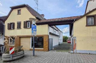 Haus kaufen in 65479 Raunheim, Raunheim - Großzügiger Bauplatz und Bestand auf 936 m²: 3-Familienhaus (+Laden) mit Entwicklungsspielraum