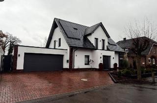 Einfamilienhaus kaufen in 49593 Bersenbrück, Bersenbrück - Modernes Einfamilienhaus mit Doppelgarage und Wintergarten