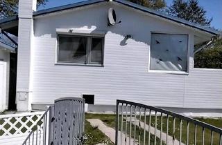 Haus kaufen in 26624 Südbrookmerland, Südbrookmerland - SCHÖNES FERIENHAUS MIT EIGENER KANAL-EINFAHRT AM HAUPTKANAL!!!