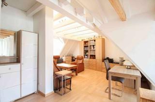 Wohnung kaufen in 38300 Wolfenbüttel, Charmante Dachgeschosswohnung in denkmalgeschütztem Fachwerkhaus – vollständig saniert & modern