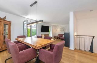 Wohnung kaufen in 85609 Aschheim, Exklusiver Wohnkomfort: Stilvolle 3-Zimmer Wohnung auf 2 Ebenen mit Privatgarten in Aschheim
