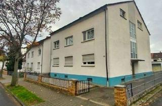 Haus kaufen in 64347 Griesheim, Vermietetes Dreifamilienhaus in ruhiger Lage