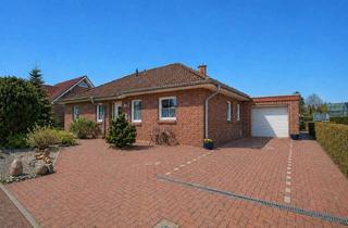 Haus kaufen in 26639 Wiesmoor, 6718 - Einziehen & Wohlfühlen: Sehr gepflegter Bungalow mit Sommergarten und Garage in ruhiger Lage!