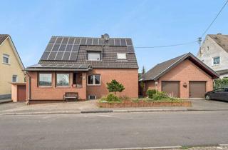 Einfamilienhaus kaufen in 53919 Weilerswist, Freistehendes Einfamilienhaus mit drei Garagen und großem Grundstück