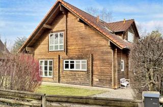 Haus kaufen in 29323 Wietze, Wietze-Wieckenberg: Blockbohlenhaus auf sonnigem Grundstück – Urlaubsfeeling für jeden Tag