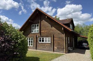 Haus kaufen in 29323 Wietze, Wietze-Wieckenberg: Blockbohlenhaus auf sonnigem Grundstück – Urlaubsfeeling für jeden Tag
