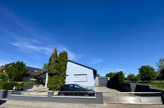 Haus kaufen in 67590 Monsheim, Hochwertige Immobilie mit Einliegerwohnung und exklusivem Außenbereich