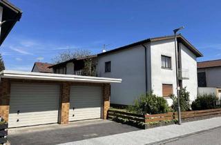 Haus kaufen in 64653 Lorsch, Freistehendes Zweifamilienhaus mit Garten und Doppelgarage in guter Lage von Lorsch