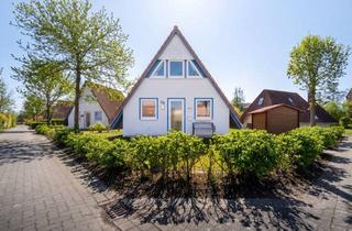 Haus kaufen in 27639 Dorum, Ferienhaus mit überdachter Terrasse und Kaminofen