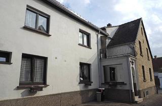 Haus kaufen in 55129 Ebersheim, Vermietetes 1–2 Familienhaus mit Entwicklungspotenzial in Mainz-Ebersheim