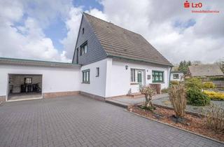 Einfamilienhaus kaufen in 26452 Sande, Gemütliches Einfamilienhaus in zentraler Lage