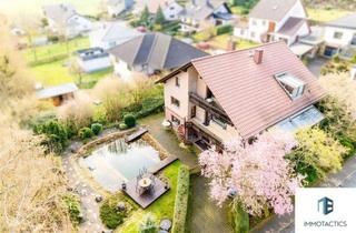 Einfamilienhaus kaufen in 55566 Kirschroth, Großzügiges Wohnhaus mit Garten, Schwimmteich & Sauna - Viel Platz auf separaten Ebenen