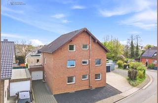 Wohnung kaufen in 52382 Niederzier, Großzügige Erdgeschosswohnung mit Wintergarten und Garagen