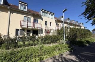 Wohnung kaufen in 76149 Neureut, Vermietete 2-Zimmer-Erdgeschosswohnung mit TG-Stellplatz, Terrasse & Gartenanteil in Neureut