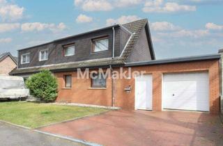 Einfamilienhaus kaufen in 45772 Marl, Charmantes Einfamilienhaus mit großem Garten, Teich, Kamin und Garage in Marl