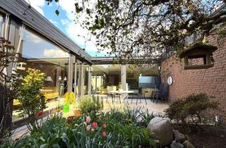 Haus kaufen in Im Schwarzfeld, 30952 Ronnenberg, Bungalow der Extraklasse mit viel Platz, großem Garten und zweiter Wohneinheit