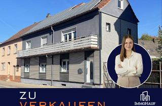 Einfamilienhaus kaufen in 67731 Otterbach, Attraktives Gesamtpaket: Vermietetes Einfamilienhaus mit Baugrundstück in Otterbach