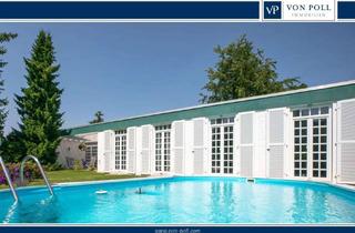 Haus kaufen in 63150 Heusenstamm, Charmanter Bungalow mit offener Wohnlandschaft, Kamin und Gartenidylle