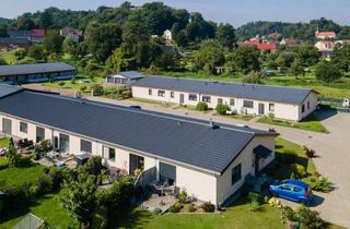 Haus kaufen in 16259 Falkenberg, Acht Wohneinheiten, Garagen, Garten u.v.m. in Falkenberg - Moderne und werthaltige Kapitalanlage!