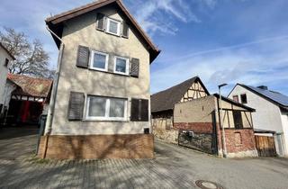 Haus kaufen in 35510 Butzbach, Vermietetes Mittel- und Hinterhaus mit Balkon und Terrasse