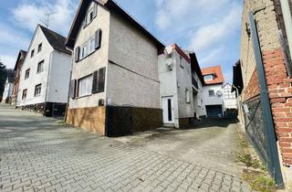 Haus kaufen in 35510 Butzbach, Vermietete Vorderhaus-Einheit mit Garage, Dachboden und historischem Charme