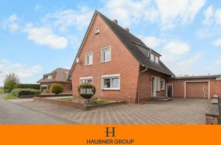 Haus kaufen in 49681 Garrel, Modernisiertes Zweifamilienhaus in Sackgassenlage am Feldrand von Garrel!