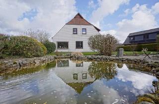Einfamilienhaus kaufen in 27624 Geestland, Geestland - Volksbank Immobilien: Flexibel! Platzwunder mit schönem Grundstück.