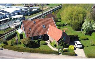 Einfamilienhaus kaufen in 26919 Brake, Brake - Wohnen mit Geschichte - Ihr neues Zuhause mit besonderem Flair im alten Bahnhof