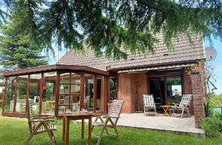 Einfamilienhaus kaufen in 23774 Heiligenhafen, Heiligenhafen - Gemütliches EFH im Heiligenhafen mit großzügigem Garten Bauland