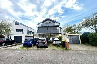 Wohnung kaufen in 76437 Rastatt, Vier-Zimmer-Wohnung mit Garten und Garage in Rastatt-Rheinau