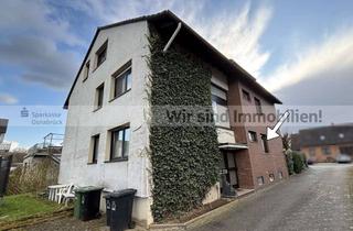 Wohnung kaufen in 49124 Georgsmarienhütte, Traumwohnung mit eigenem Garten & Garage