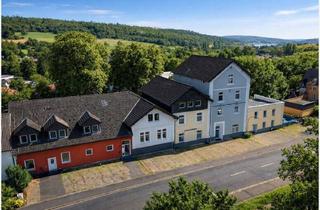Mehrfamilienhaus kaufen in 63679 Schotten, Renditestarkes Mehrfamilienhaus-Ensemble mit 18 Einheiten und Entwicklungspotenzial