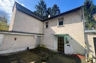 Einfamilienhaus kaufen in 53639 Königswinter, Kleines Einfamilienhaus mit großzügigem Garten und Garage in ruhiger Lage von Heisterbacherrott