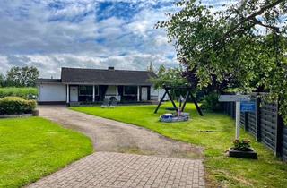 Haus kaufen in 26969 Butjadingen, Ferienhaus mit Seltenheitswert - ruhiges Ferienidyll mit zwei ertragsstarken Einheiten!