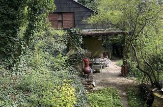 Grundstück zu kaufen in 71229 Leonberg, Wochenend Gartengrundstück mit genehmigtem Gartenhaus – Leonberg