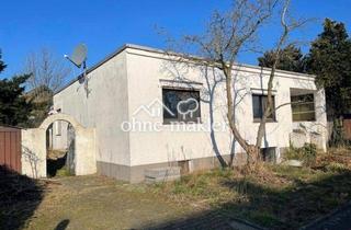 Doppelhaushälfte kaufen in 47259 Duisburg, Bungalow auf schönem Eckgrundstück nähe Rhein