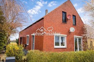 Einfamilienhaus kaufen in 28844 Weyhe, Hausteil mit Garten & DoppelhausCharakter in traumhafter idyllischer Lage